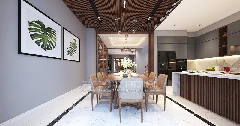 Bộ bàn ghế ăn 8 ghế gỗ óc chó cao cấp cùng chất liệu nệm bọc êm ái được thiết kế tối giản giúp không gian trở nên thông thoáng nhưng không kém phần hiện đại, sang trọng. Thiết kế phòng ăn biệt thự