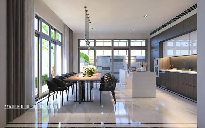 Trang trí nội thất phòng ăn hiện đại nhưng đẹp thông thoáng bởi ý tưởng tạo nên không gian mở từ hệ cửa kính rộng, lớn. Thiết kế phòng ăn biệt thự
